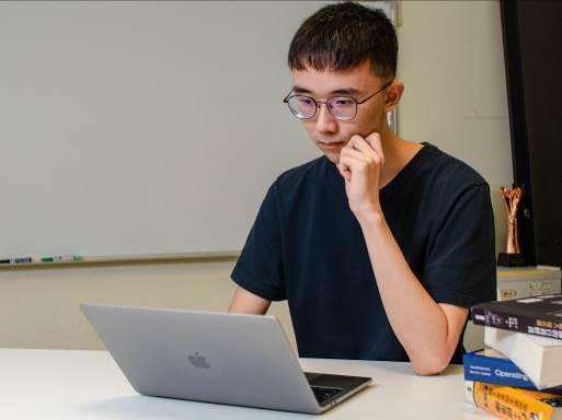 
Wang helped tackle the topic on artificial intelligence by teaching the computer to do a cloze test.