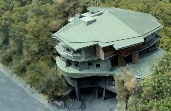 The building is designed to blend into its surroundings.