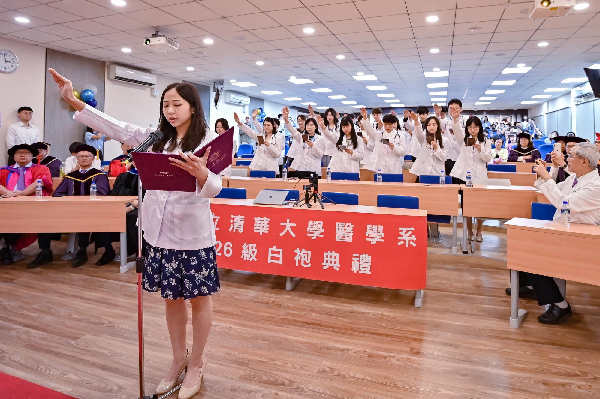 Medical students, clad in their white coats, took the oath while holding onto their initial intentions of becoming doctors.