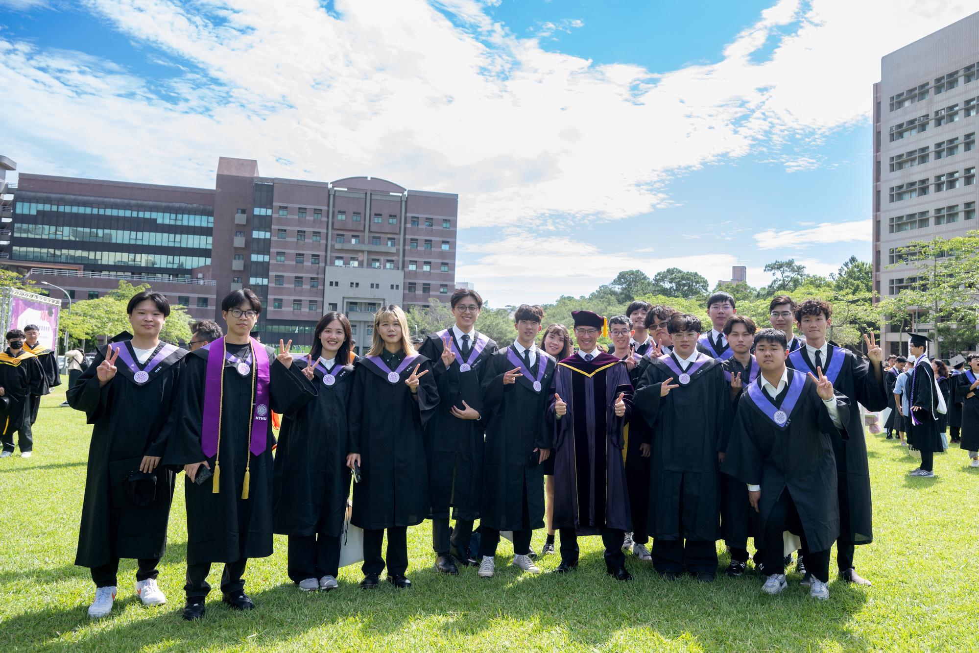 Many graduates took group photos with faculty, mentors, and family members on the Campus Green.