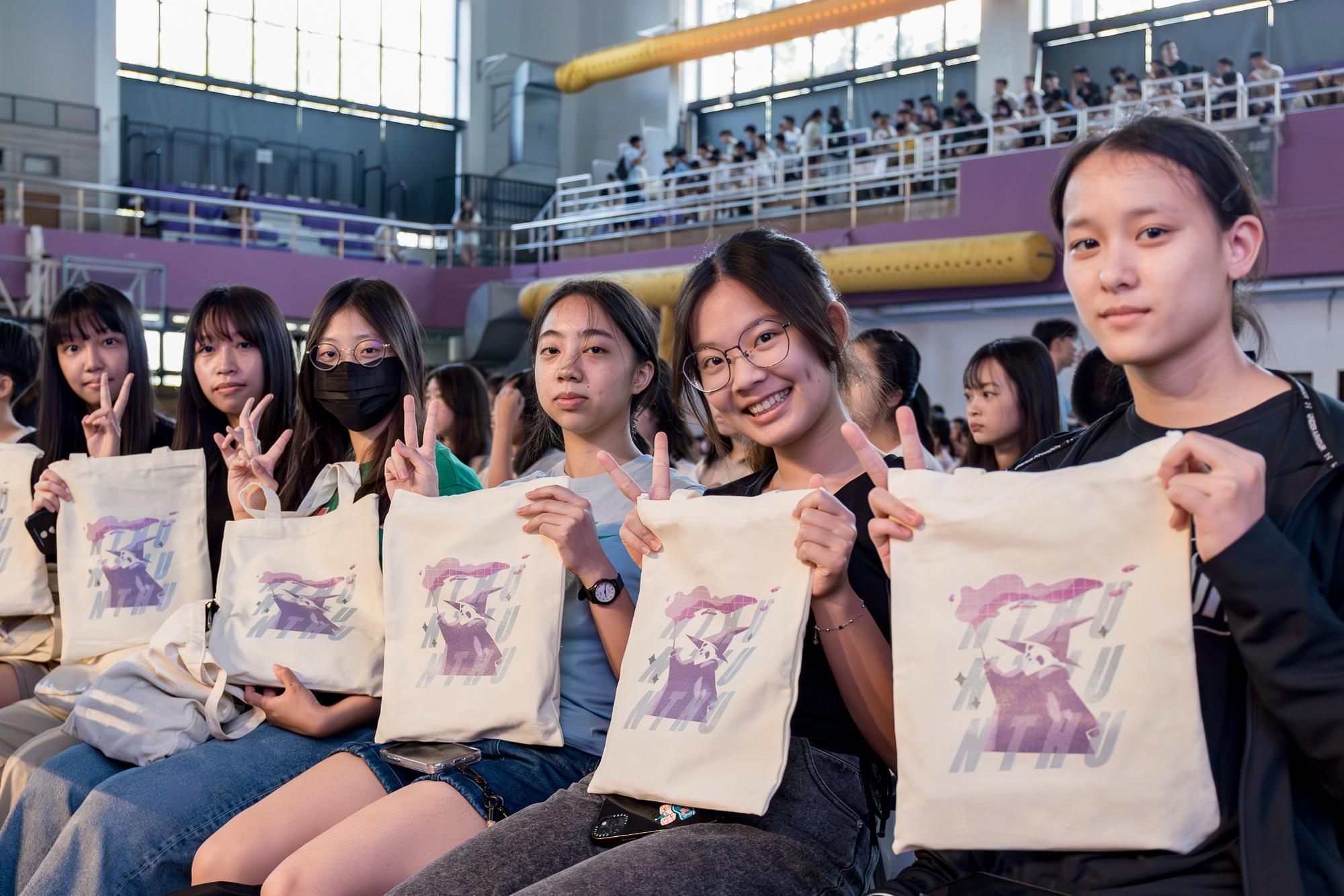 NTHU freshmen with their gift packs.