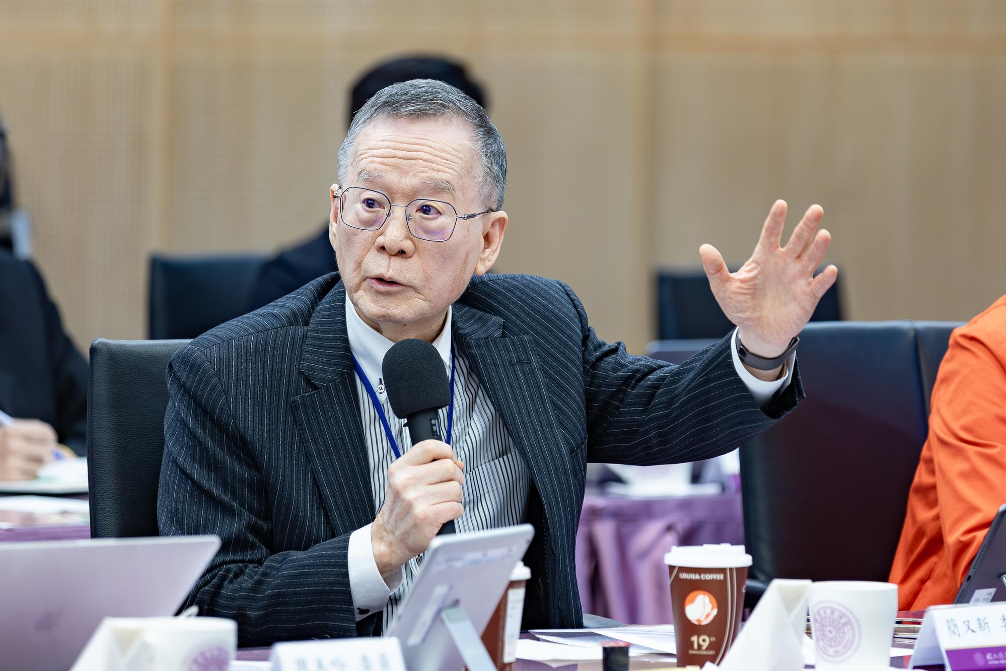 Eugene Chien speaks at the meeting.