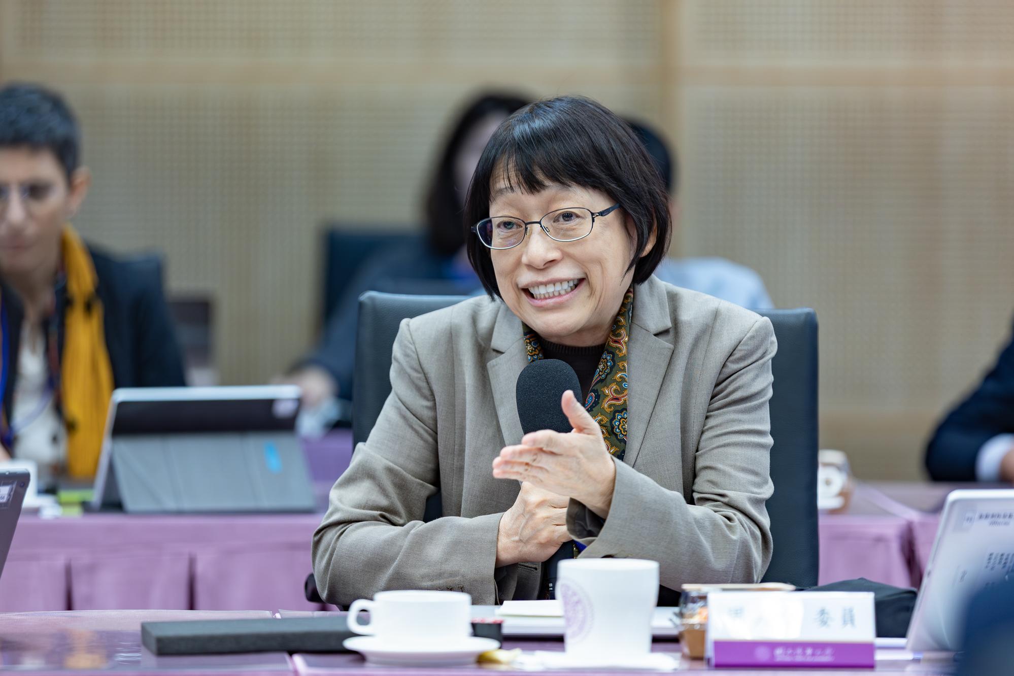 Mei-Yin Chou speaks at the meeting.