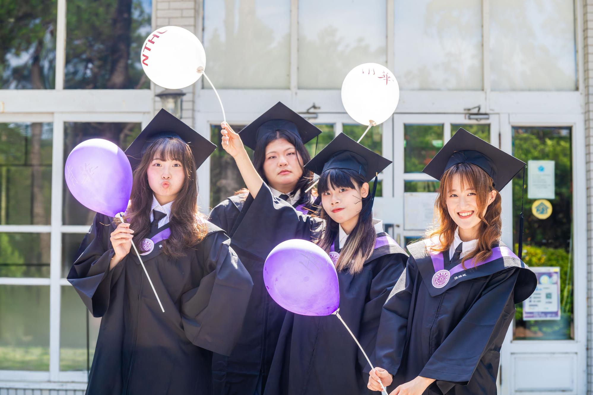 NTHU graduates pose for photos in their academic regalia ahead of the university's 2026 Commencement Ceremony.