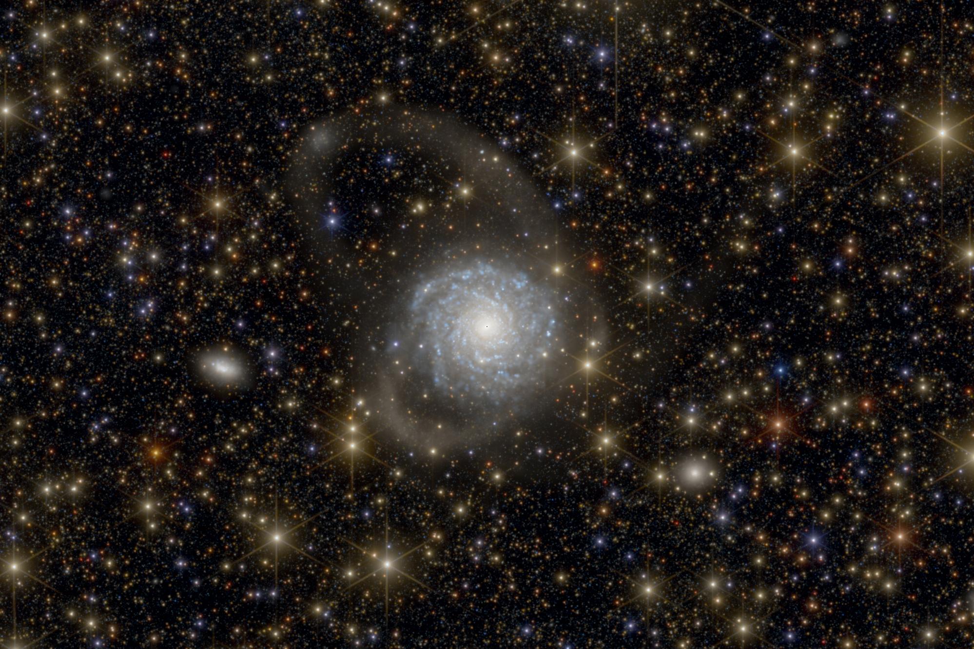 The ARRAKIHS mission will explore faint structures in the outer regions of galaxies to shed new light on how galaxies form and evolve. (Image courtesy of the ARRAKIHS Mission Consortium)