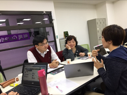 Mentors and students meet at the Creativity Garage.