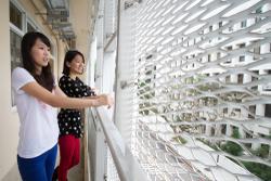 The Lee Tsen Min Building features an attractive white curtain wall which allows light and air in while blocking direct sunlight, thereby reducing air-conditioning costs by around 70 percent.