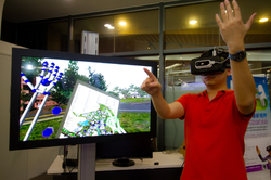 A team of faculty members and students spent three years creating a VR system of the entire NTHU campus. Wearing a head-mounted display, lightly touch the map to visit any sight on campus.