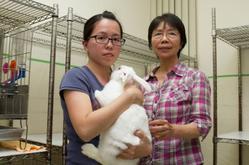 Prof. Fong-In Chou (right) and assistant