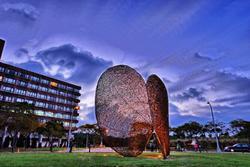 
The stylized leaf invites viewers to interact with it both day and night.