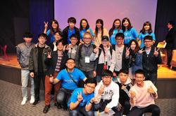 
Tu with students after his speech.