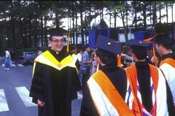 President Shen with graduating students in 1994.
