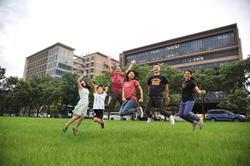 Jumping for joy in front of the Tsinghua Lab.
