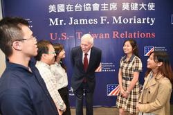 
Students chatting with Moriarty after his talk.
